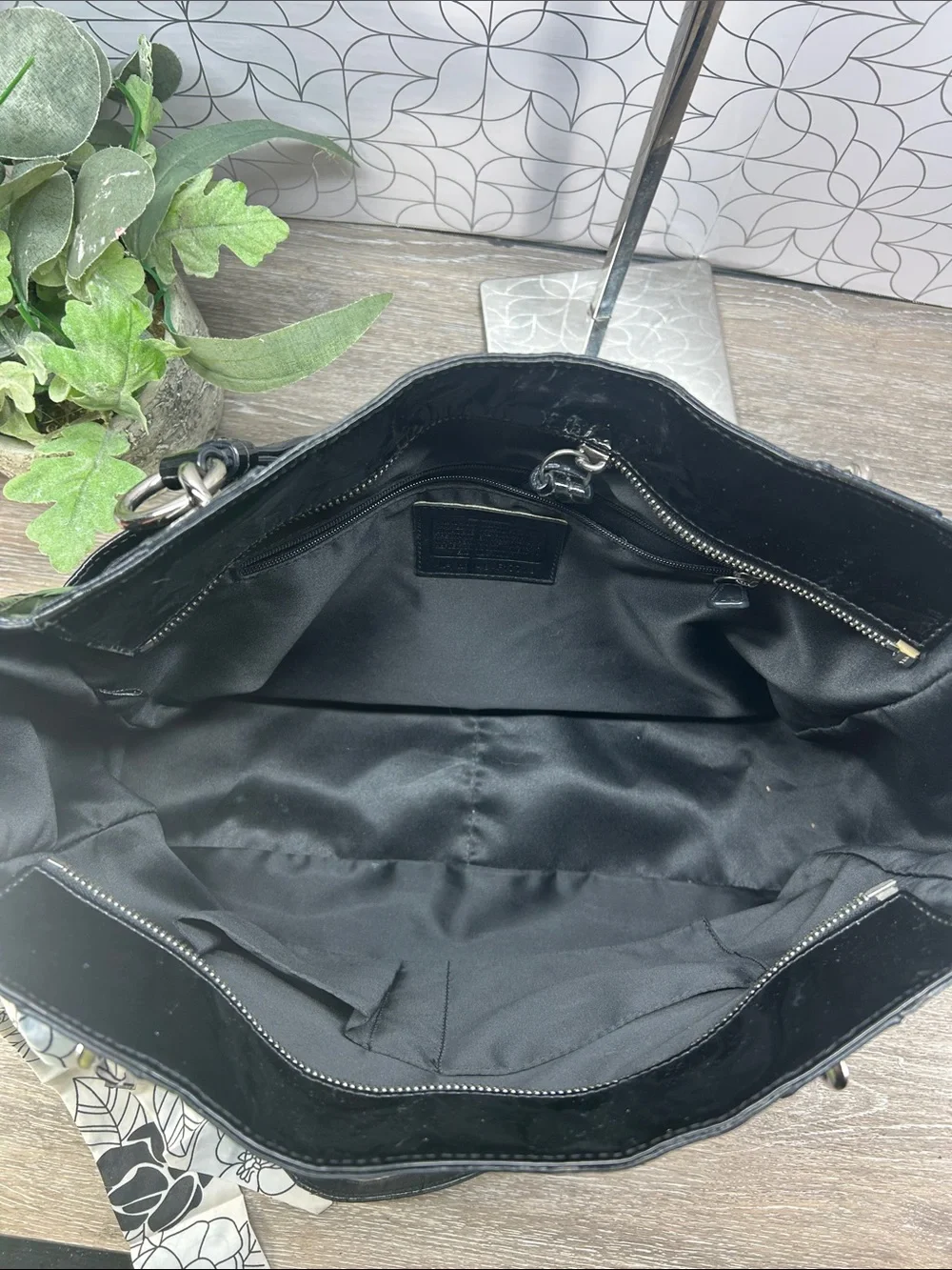 Coach black patent leather zip top tote bag